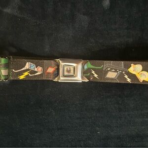 Buckle-Down Men's Printed Seatbelt Belt with 80’s arcade game theme print.